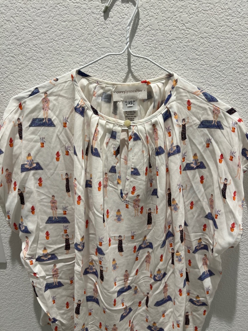Corey Lynn Calter Blouse with girl figure motif